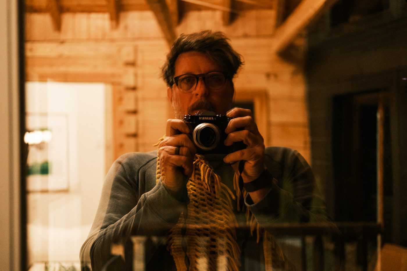 Josh Letchworth, self-portrait in the cabin window
